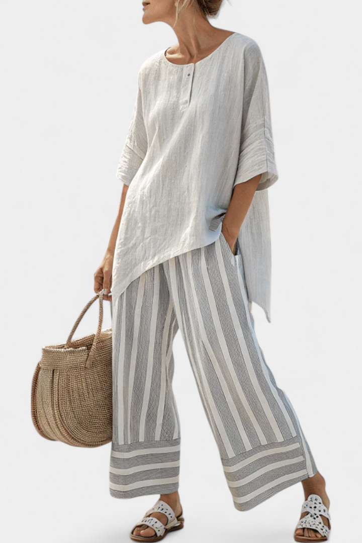 Talvora | Blusa Asimétrica Elegante y Pantalones Rayados