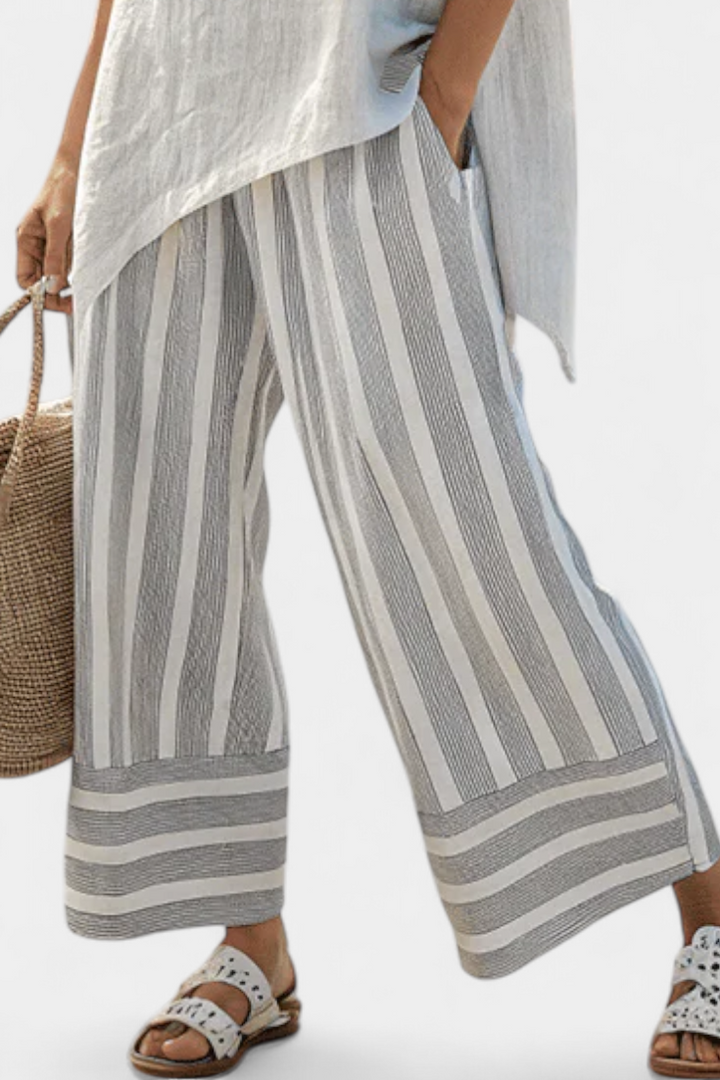 Talvora | Blusa Asimétrica Elegante y Pantalones Rayados